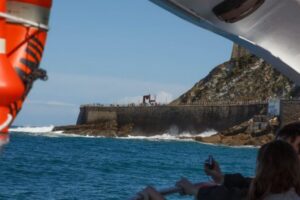 San Sebastian: Boat Tour with Stop at Santa Clara - Santa Clara Island: beach time, lighthouse art, and low-tide swims